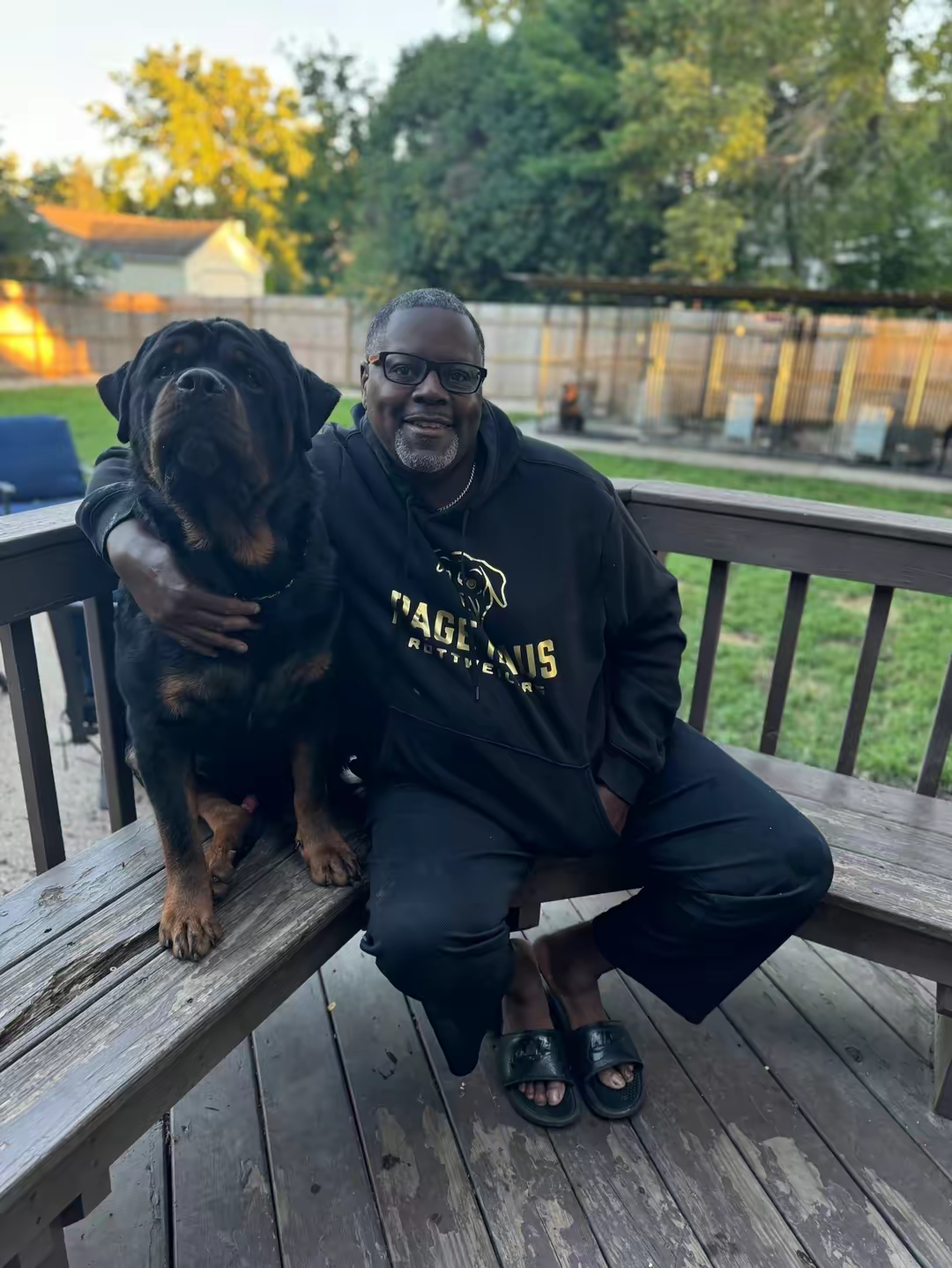 Willie Page proudly posing with a Page Haus Rottweiler